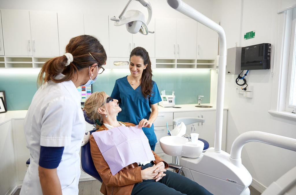 Dentists working with a patient at Tuart Hill Dental Clinic in Perth